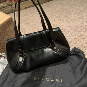 Bvlgari Black leather purse with gold hardware!